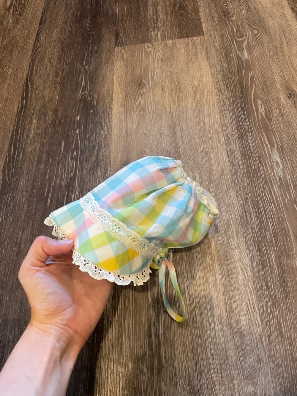 white and multicolor plaid baby bonnet